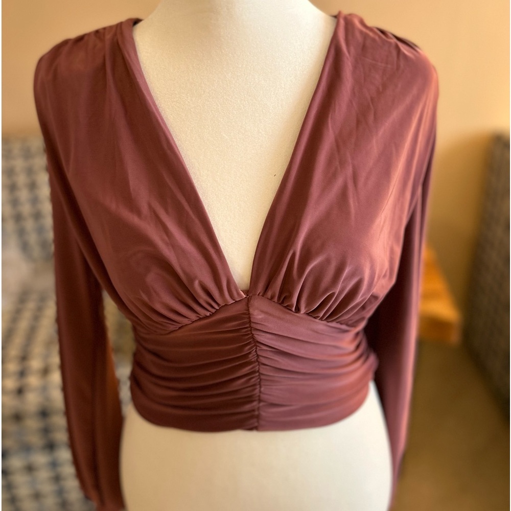 Gorgeous and silky, soft pink top.